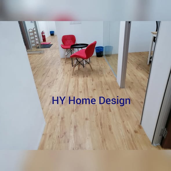 Laminate flooring installation in an office space by HY Home Design